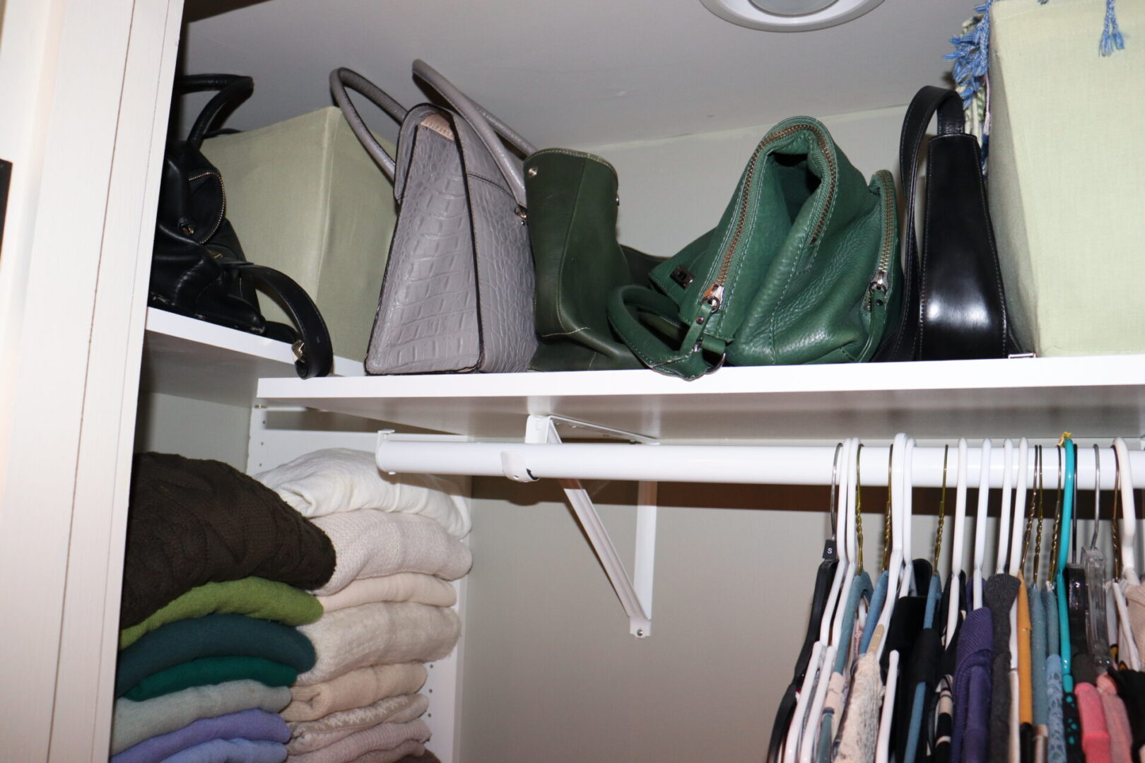 Closet shelves dedicated to bags