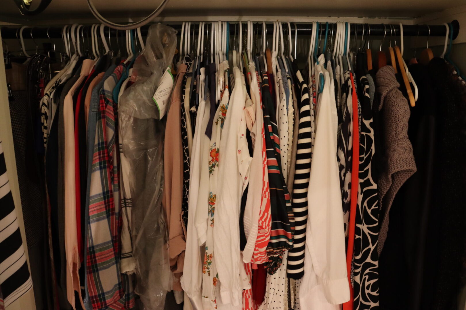 Hanger closet with assorted clothes